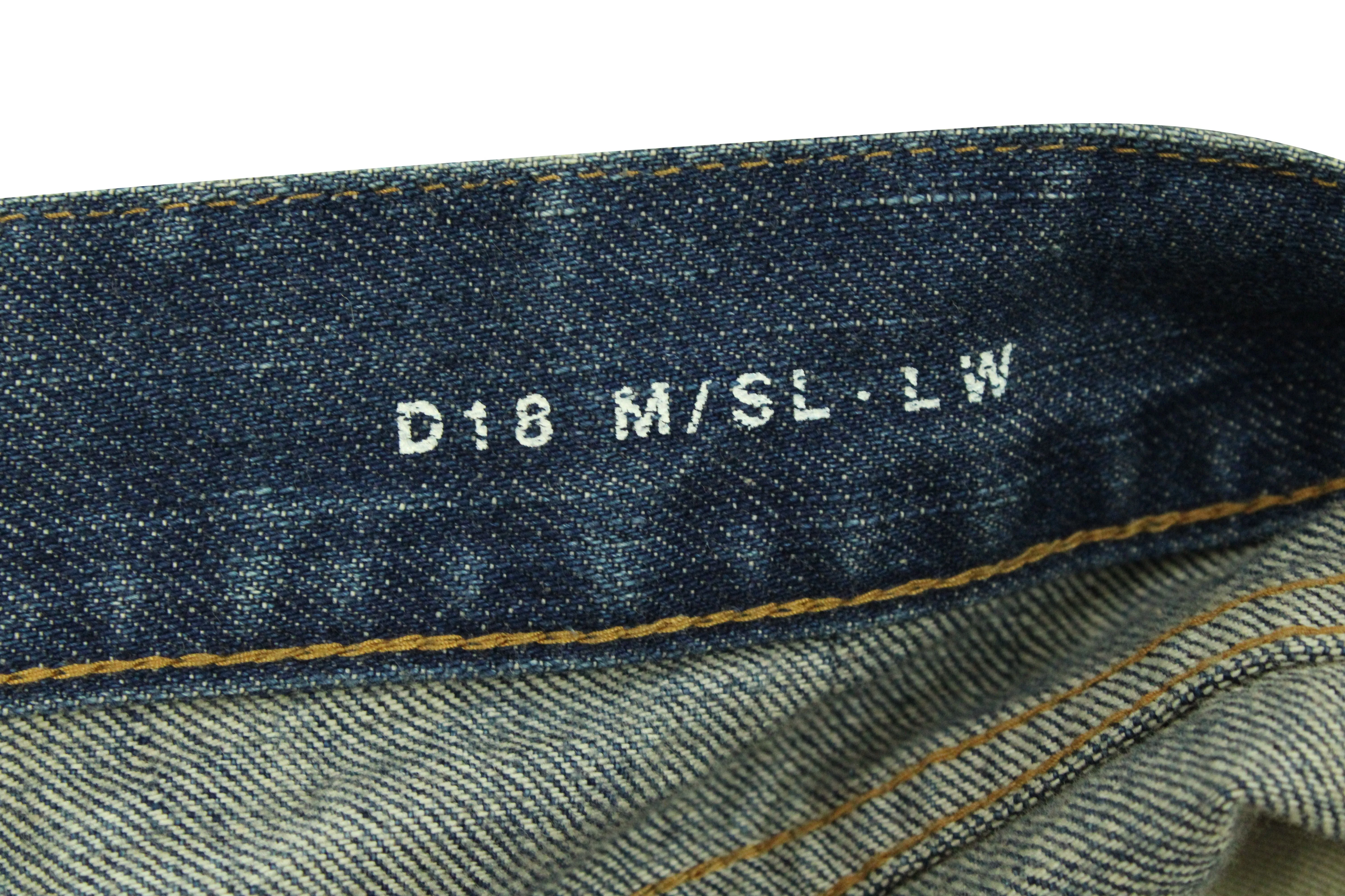 Saint Laurent Distressed Straight Leg Jeans in Blue Cotton Denim